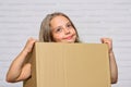 Make moving easier. Girl small child carry cardboard box. Move out concept. Delivering your purchase. Kid moving out