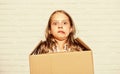 Make moving easier. Girl small child carry cardboard box. Move out concept. Prepare for moving. Rent house. Real estate