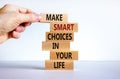 Make smart choice symbol. Concept words `Make smart choice in your life` on wooden blocks on a beautiful white background.