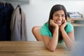 Make success your own. Portrait of a smiling young female designer sitting at her desk in an office. Royalty Free Stock Photo