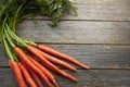 Make them the root of a healthier diet. a bunch of fresh carrots on a table. Royalty Free Stock Photo