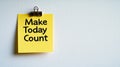 Make Today Count Motivational Message on a Yellow Sticky Note Against a White Backdrop Royalty Free Stock Photo