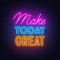 Make Today Great neon lettering on brick wall background.