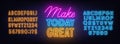 Make Today Great neon lettering on brick wall background.