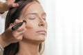 Make up artist contouring the face Royalty Free Stock Photo