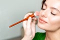 Make up artist applying skin tone Royalty Free Stock Photo