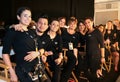 Make up artists team posing backstage before the MIKOH Resort 2019 Runway Show