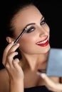 Make-up. Beautiful Woman Doing Makeup. Eyebrow Pencil. Red Lips Royalty Free Stock Photo