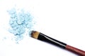 Make-up brush with blue eyeshadows Royalty Free Stock Photo