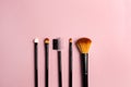 Make up brush on colorful background. Fashion model. Beauty, skincare. Black background. Makeup, cosmetics. Beauty woman Royalty Free Stock Photo