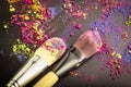 Make-up brushes on color background