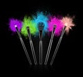 Make up brushes with colourful powder splashes on black Royalty Free Stock Photo