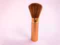 Make up brushes with powder splashes isolated on pink background Royalty Free Stock Photo