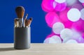 Make up brushes set on table in container Royalty Free Stock Photo