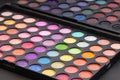 Make-up colorful eyeshadow palettes isolated on black background Royalty Free Stock Photo