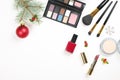 Make up cosmetic with Christmas decoration on white background flat lay Royalty Free Stock Photo