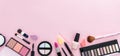 Make up cosmetics products against pink color background, banner Royalty Free Stock Photo