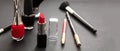 Make-up cosmetics accessories against black background Royalty Free Stock Photo