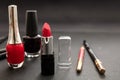 Make-up cosmetics accessories against black background Royalty Free Stock Photo