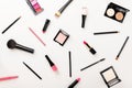 Make-up cosmetics products and tools set. Contouring powder, highlighter, blush, lipstick kit, makeup brushes, lip pencil,