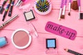 Make up items on pink background. Royalty Free Stock Photo