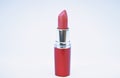 Daily make up. Lipstick for professional make up. Adding some shine to lips. Lip care concept. Lipstick on white