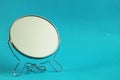 Make up mirror, blue background, free copy space, selective focus Royalty Free Stock Photo