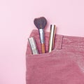 Make-up in pink pants pocket