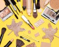 Make-up products brown and golden colors - autumn makeup flatlay