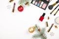 Make up cosmetic with Christmas decoration on white background flat lay Royalty Free Stock Photo