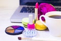 Make up products and a laptop