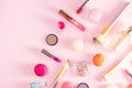 Make up products and macaroons Royalty Free Stock Photo