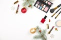 Make up set cosmetic with christmas decoration on white background flat lay Royalty Free Stock Photo