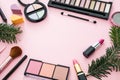 Make up xmas cosmetics products against pink color background Royalty Free Stock Photo