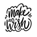 Make a Wish calligraphy phrase. Black ink. Hand drawn vector lettering. Royalty Free Stock Photo