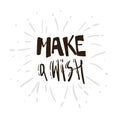 Make a wish. vector phrase. Inspirational and motivational quote handwritten with black brush. Brush calligraphy. Hand Royalty Free Stock Photo