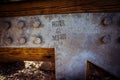 `MAKE A WISH` written on a galvanized steel and wooden bridge