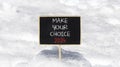 Make your choice 2024 symbol. Concept words Make your choice 2024 on beautiful black chalk blackboard. Beautiful white snow Royalty Free Stock Photo