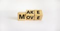 Make your move symbol. Turned wooden cubes with words `Make move`. Beautiful white background. Make your move and business conce Royalty Free Stock Photo