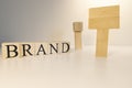 Make your own brand. Brand word with wooden letter cubes