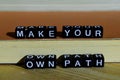 Make your own path on wooden blocks. Motivation and inspiration concept Royalty Free Stock Photo