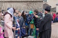 Makeevka, Ukraine - April 01, 2018: Priest performs the ritual with the parishioners to consecrating the willow