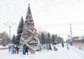 Makeevka, Ukraine - December 29, 2015: Citizens in the central square near the Christmas tree