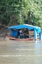 Makeshift gold barge on river