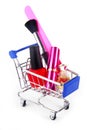 Makeup accessories in shopping trolley Royalty Free Stock Photo