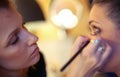 Makeup artist applying eyeshadow Royalty Free Stock Photo