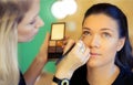 Makeup artist applying eyeshadow Royalty Free Stock Photo