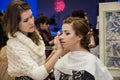 Makeup artist bring make-up girl