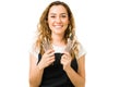 Makeup artist holding her makeup brushes at a salon Royalty Free Stock Photo