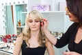 Makeup artist at work in salon Royalty Free Stock Photo